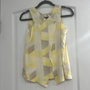 Yellow tripped tank top with zipper on the the back